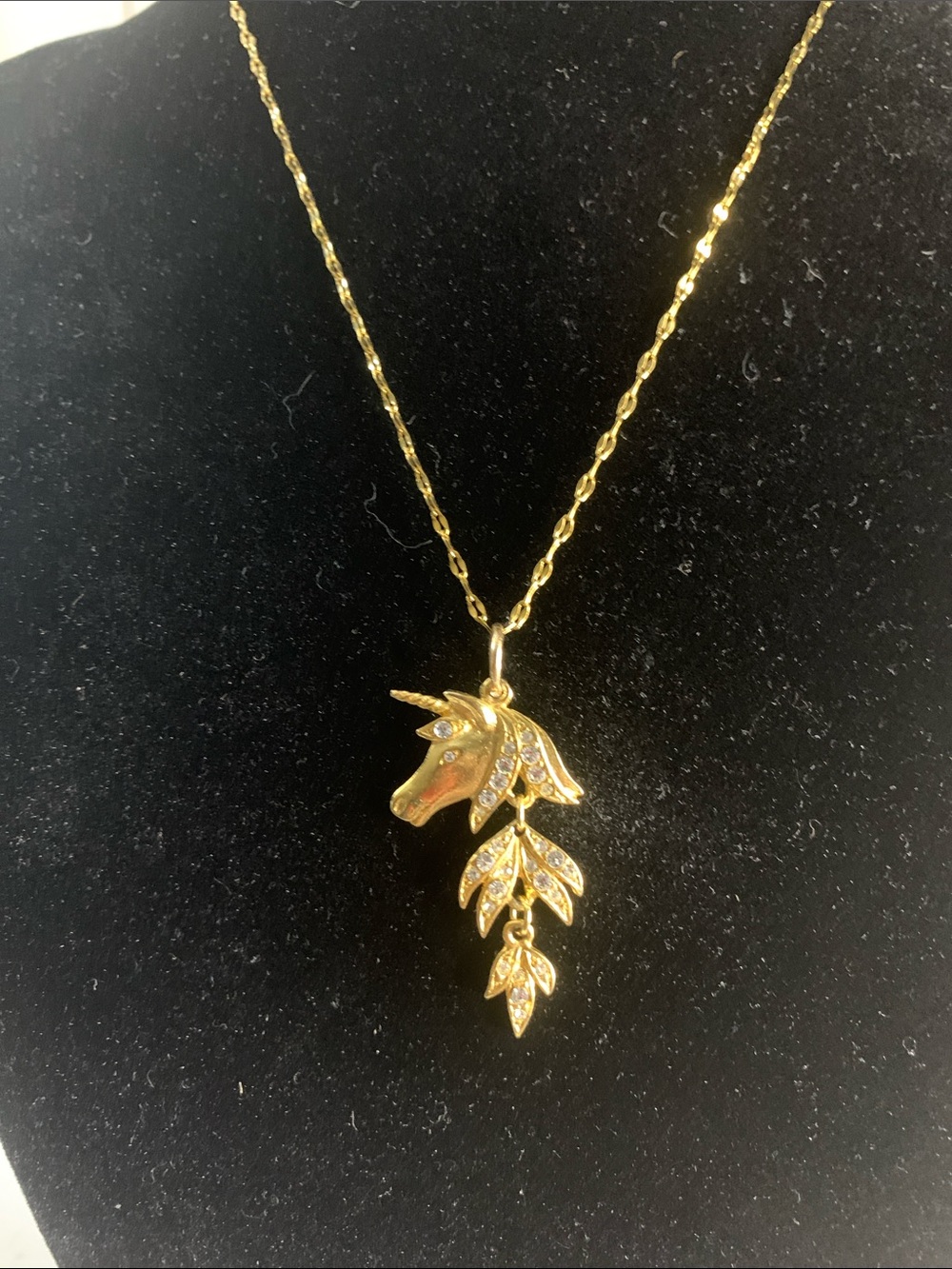 Gold Unicorn Pendant Necklace with Crystal Accents. Stainless steel chain